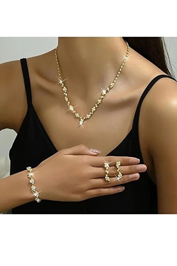 shopidik طقم مجوهرات بتصميم فرع زهرة ذهبية اللون مرصع بأحجار الزركون اللامعة